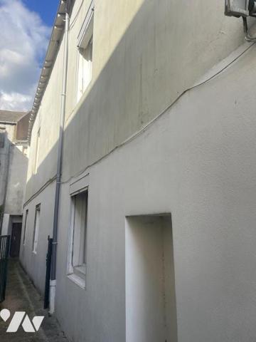 UN APPARTEMENT T4 + CAVE + JARDIN