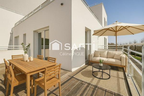 Appartement lumineux 3 pièces avec terrasse et 2 places de parking.