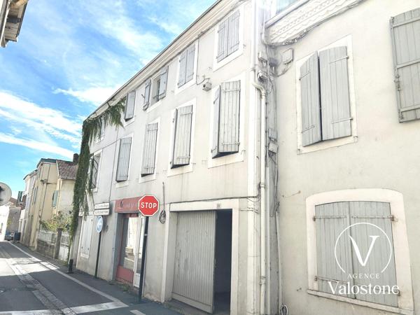 Immeuble 4 appartements + local commercial