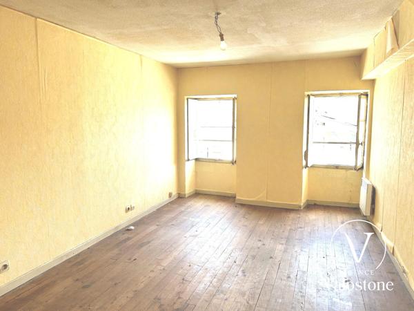Immeuble 4 appartements + local commercial