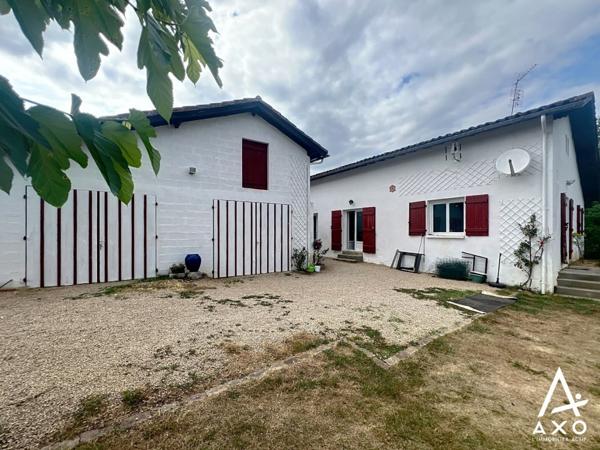 Maison de charme avec garage double sur 1hec de terrain