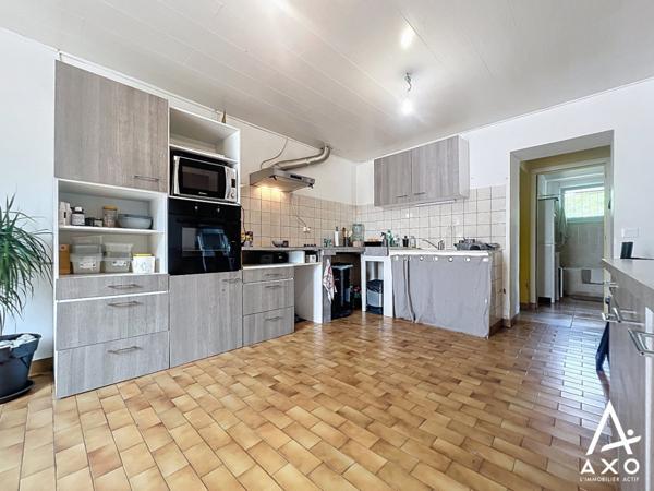 Maison de charme avec garage double sur 1hec de terrain