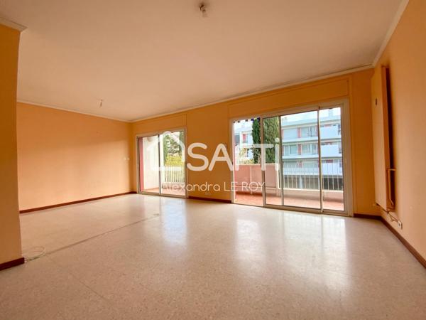 APPARTEMENT + PLACE DE STATIONNEMENT + CAVE