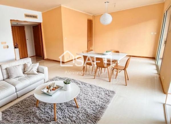 APPARTEMENT + PLACE DE STATIONNEMENT + CAVE