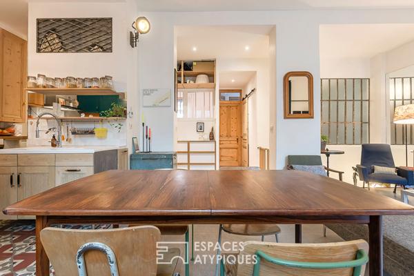 Appartement en rez de jardin esprit maison avec véranda