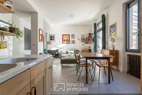 Appartement en rez de jardin esprit maison avec véranda