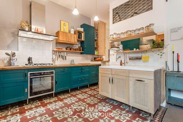 Appartement en rez de jardin esprit maison avec véranda