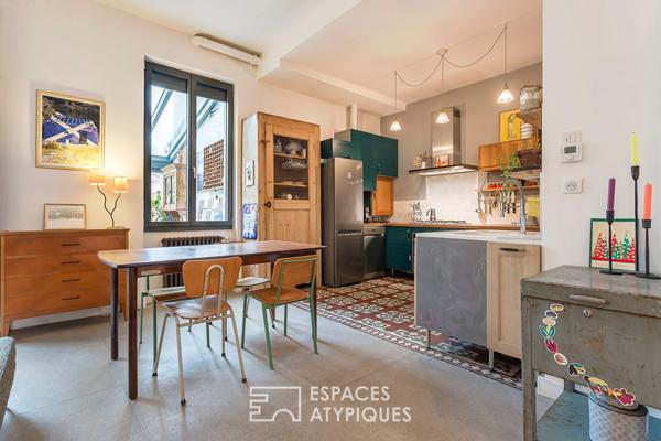 Appartement en rez de jardin esprit maison avec véranda