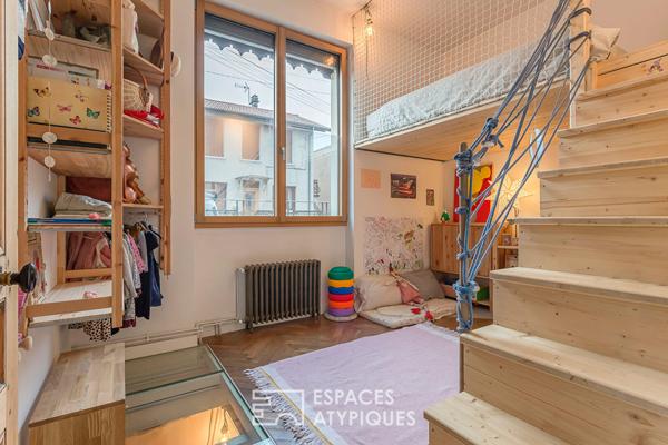 Appartement en rez de jardin esprit maison avec véranda
