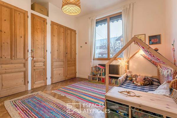 Appartement en rez de jardin esprit maison avec véranda