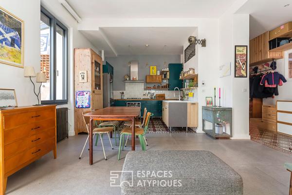 Appartement en rez de jardin esprit maison avec véranda