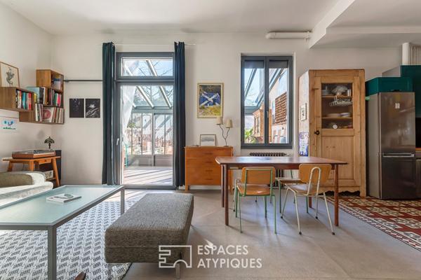 Appartement en rez de jardin esprit maison avec véranda