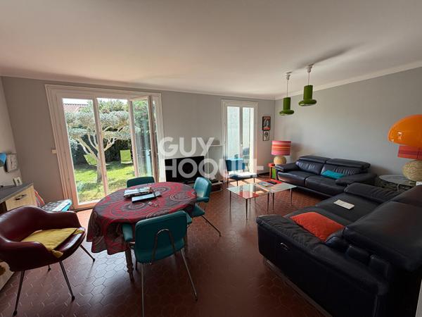 Charmante maison de plain-pied avec jardin et garage