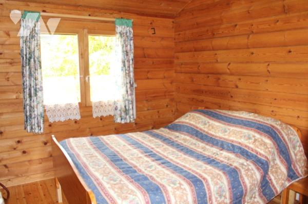Chalet en bois d'env. 60m² sur sous-sol avec vue imprenable sur  725m² de terrain
