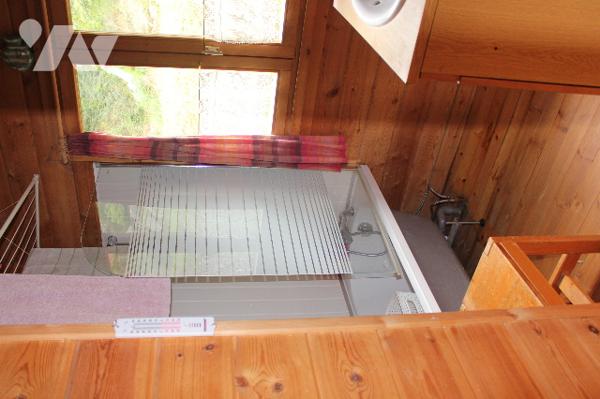 Chalet en bois d'env. 60m² sur sous-sol avec vue imprenable sur  725m² de terrain