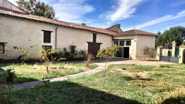 Immeuble centre Neuville 216m2+ dépendances