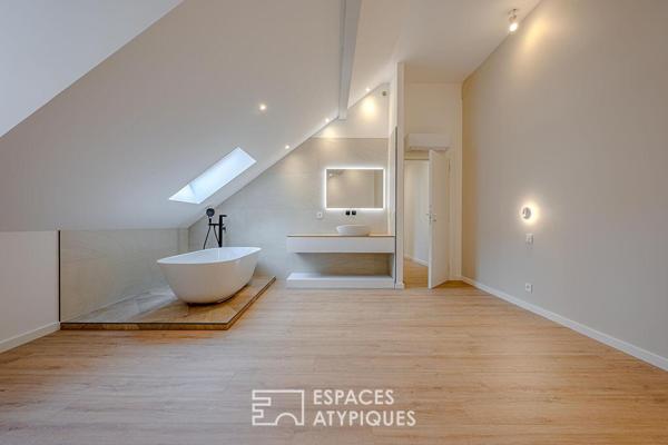 Elégant duplex rénové en coeur de ville