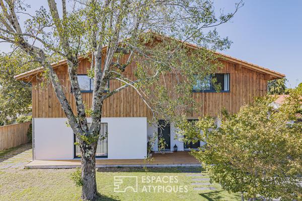 Maison de famille, mélange de bois et de modernité