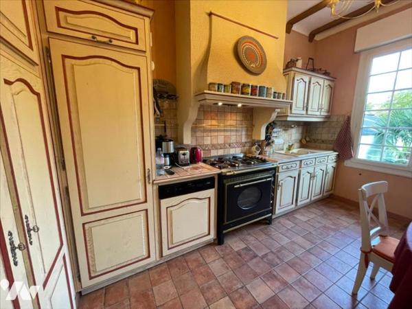 Maison rond point de vannes