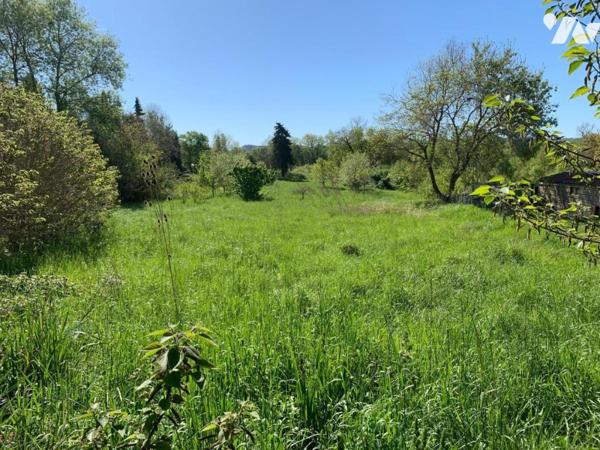 Terrain à bâtir proche centre village