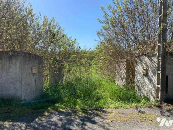 Terrain à bâtir proche centre village