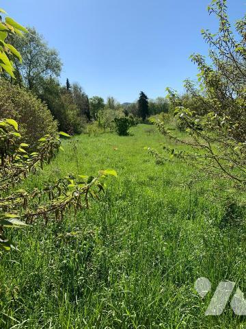 Terrain à bâtir proche centre village