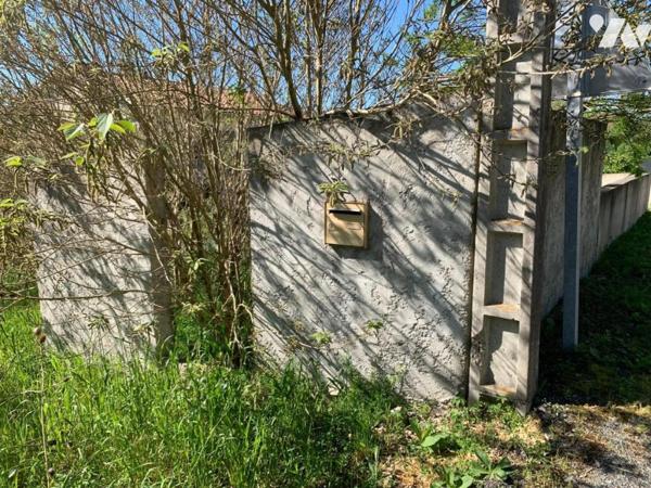 Terrain à bâtir proche centre village