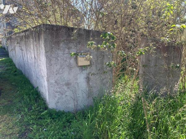 Terrain à bâtir proche centre village