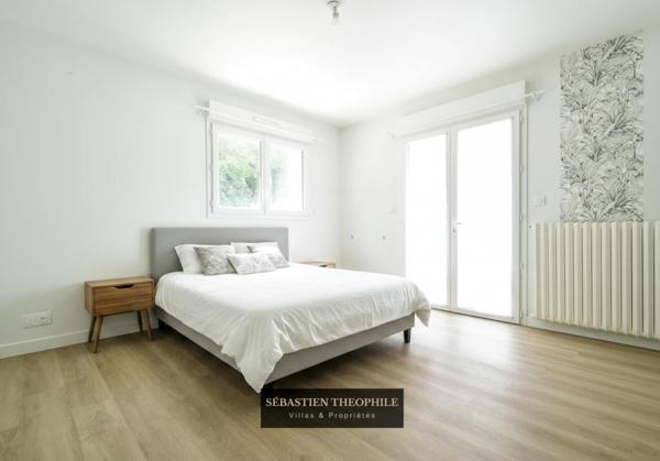 Propriété T5 contemporaine avec piscine proche centre