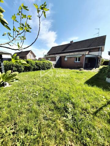 Maison semi individuelle, garage et jardin
