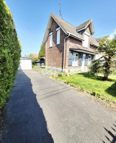 Maison semi individuelle, garage et jardin