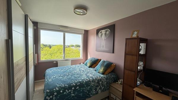 Appartement T4 lumineux avec vue dégagée - stationnement sous-sol