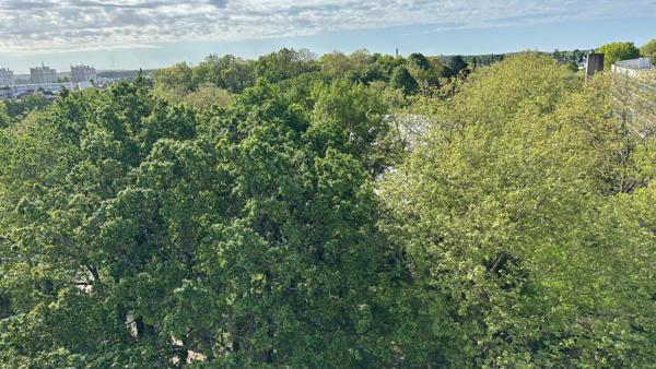 Appartement T4 lumineux avec vue dégagée - stationnement sous-sol