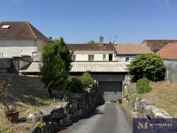 ENSEMBLE IMMOBILIER AVEC LOCAL COMMERCIAL ET LOGEMENT AVEC JARDIN Détails des diagnostics énergétiques