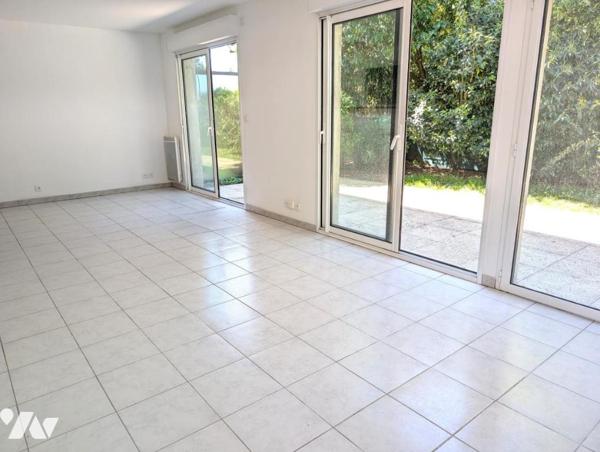 Appartement rez-de-jardin centre