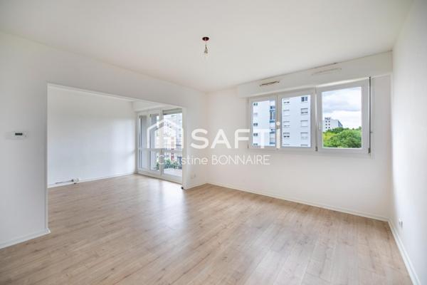 Appartement T4 avec 2 chambres, cave et garage à 15mn du centre ville