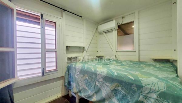 A louer - Maison de type bungalow - 3 pièces avec terrasse, bac à punch et piscine commune