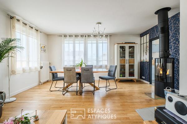 Maison sixties revisitée : confort contemporain et jardin paysagé