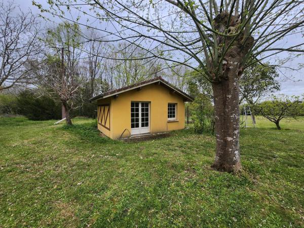 Grande maison sur magnifique terrain boisé