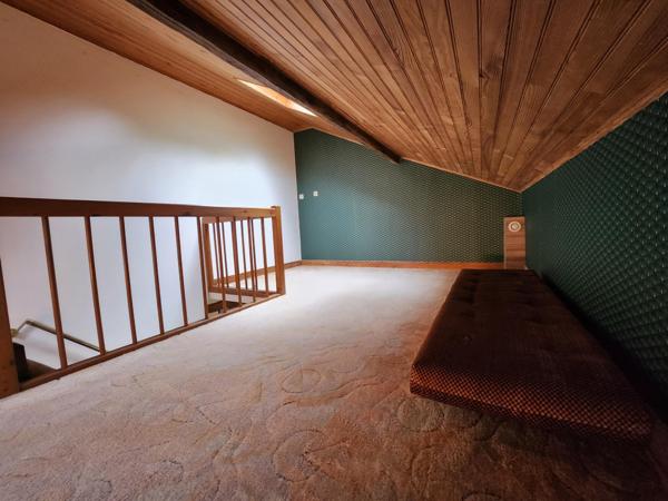 Grande maison sur magnifique terrain boisé