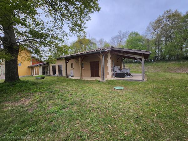 Grande maison sur magnifique terrain boisé