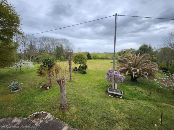 Grande maison sur magnifique terrain boisé