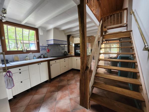 Grande maison sur magnifique terrain boisé