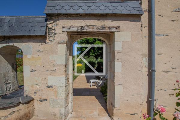 Bâtisse historique avec jardin arboré