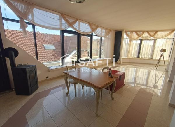 Élégance, espace et confort en plein centre