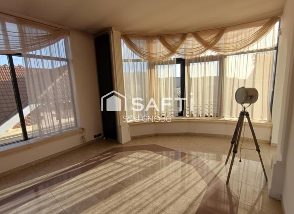 Élégance, espace et confort en plein centre