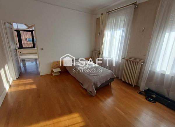 Élégance, espace et confort en plein centre