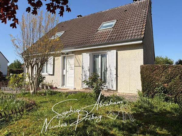 Maison individuelle avec 4 chambres, sous-sol et jardin