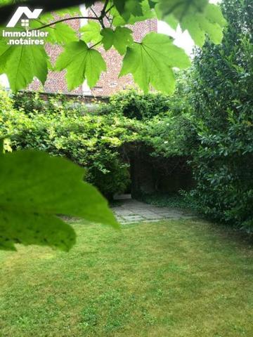 Appartement F4 avec parking et jardin privatif