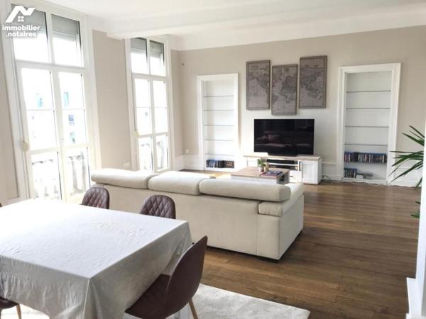 Appartement F4 avec parking et jardin privatif